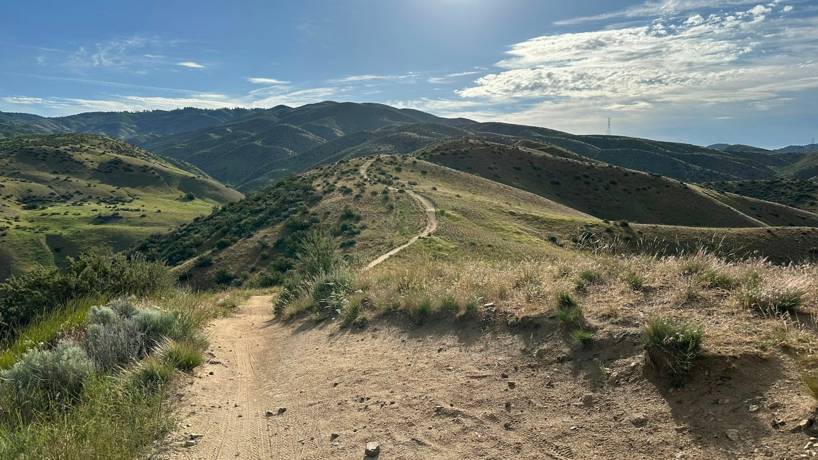 Easy hiking trail through the Boise foothills with the city and mountains visible below.